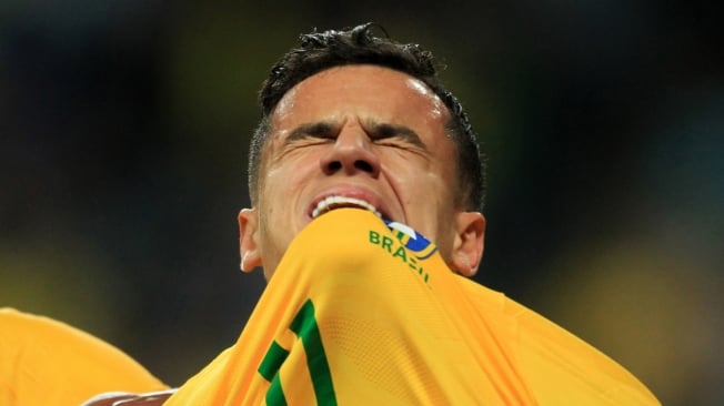 Brazil's Philippe Coutinho celebrates after scoring against Ecuador during their 2018 World Cup football qualifier match in Porto Alegre, Brazil, on August 31, 2017. / AFP PHOTO / Itamar AGUIAR