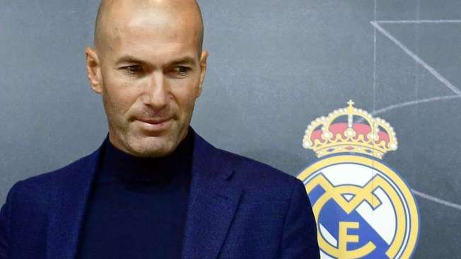 Real Madrid's French coach Zinedine Zidane looks on after a press conference to announce his resignation in Madrid on May 31, 2018.
Real Madrid coach Zinedine Zidane said today he was leaving the Spanish giants, just days after winning the Champions League for the third year in a row.

 / AFP PHOTO / PIERRE-PHILIPPE MARCOU