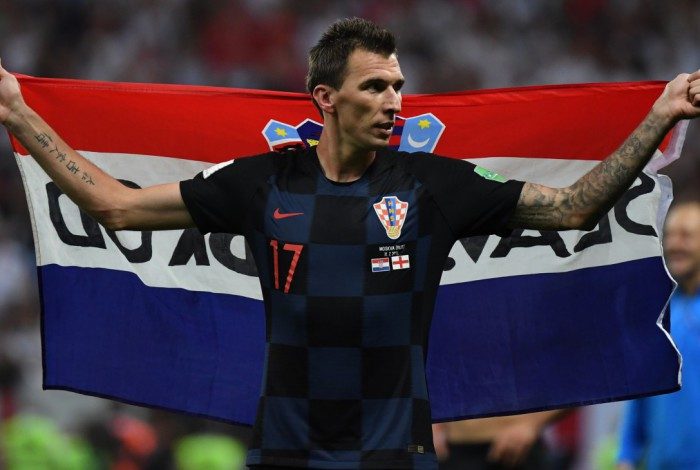 Croatia's forward Mario Mandzukic celebrates at the end of the Russia 2018 World Cup semi-final football match between Croatia and England at the Luzhniki Stadium in Moscow on July 11, 2018. / AFP PHOTO / YURI CORTEZ / RESTRICTED TO EDITORIAL USE - NO MOBILE PUSH ALERTS/DOWNLOADS