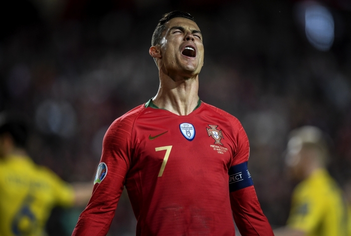 Portugal's forward Cristiano Ronaldo shouts during the Euro 2020 qualifying football match Portugal vs Ukraine at Luz stadium in Lisbon on March 22, 2019. (Photo by PATRICIA DE MELO MOREIRA / AFP)