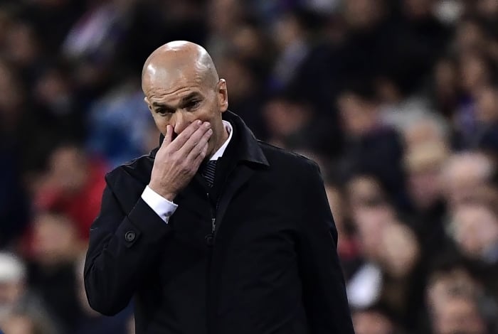 Real Madrid's French coach Zinedine Zidane reacts during the Spanish League football match between Real Madrid CF and SD Huesca at the Santiago Bernabeu stadium in Madrid on March 31, 2019. (Photo by JAVIER SORIANO / AFP)