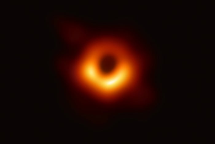 A handout photo provided by the European Southern Observatory on April 10, 2019 shows the first photograph of a black hole and its fiery halo, released by Event Horizon Telescope astronomers (EHT), which is the 