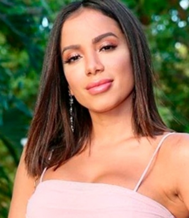 Anitta dá bela bronca em criança que deu um tapa na avó durante festa de casamento - Reprodução Internet
