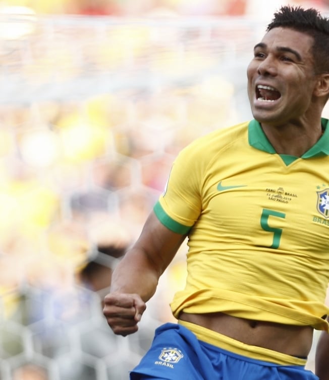 Brazil's Casemiro celebrates after scoring against Peru during their Copa America football tournament group match at the Corinthians Arena in Sao Paulo, Brazil, on June 22, 2019. (Photo by Miguel SCHINCARIOL / AFP) - AFP