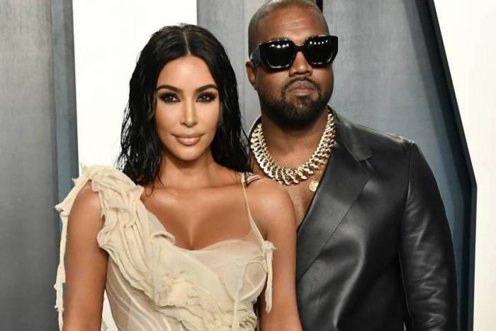 Kanye West ao lado da mulher, Kim Kardashian