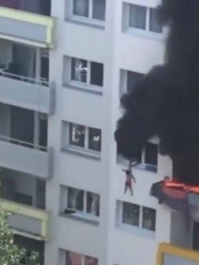 Criança caindo de prédio na França