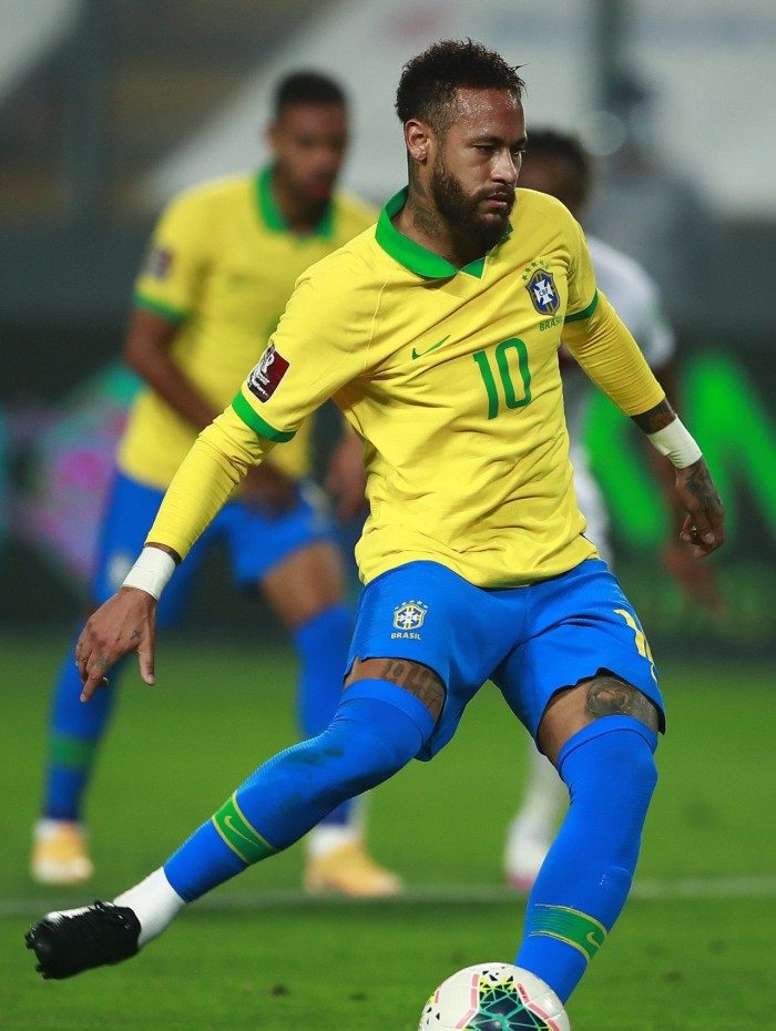 Brazil's Neymar takes a penalty to score against Peru during their 2022 FIFA World Cup South American qualifier football match at the National Stadium in Lima, on October 13, 2020, amid the COVID-19 novel coronavirus pandemic. (Photo by Daniel APUY / POOL / AFP)