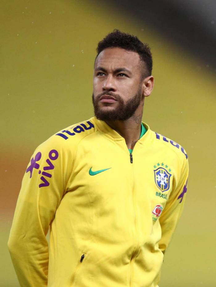 Brazil's Neymar listens to the national anthem during the 2022 FIFA World Cup South American qualifier football match against Bolivia at the Neo Quimica Arena, also known as Itaquerao, in Sao Paulo, Brazil, on October 9, 2020, amid the COVID-19 novel coronavirus pandemic. (Photo by Buda Mendes / POOL / AFP)