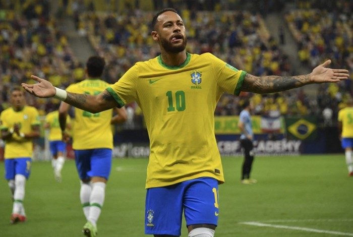 Brazil's Neymar celebrates after scoring against Uruguay during the South American qualification football match for the FIFA World Cup Qatar 2022, in Arena Amazonia, Manaus, Brazil, on October 14, 2021. (Photo by NELSON ALMEIDA / AFP)