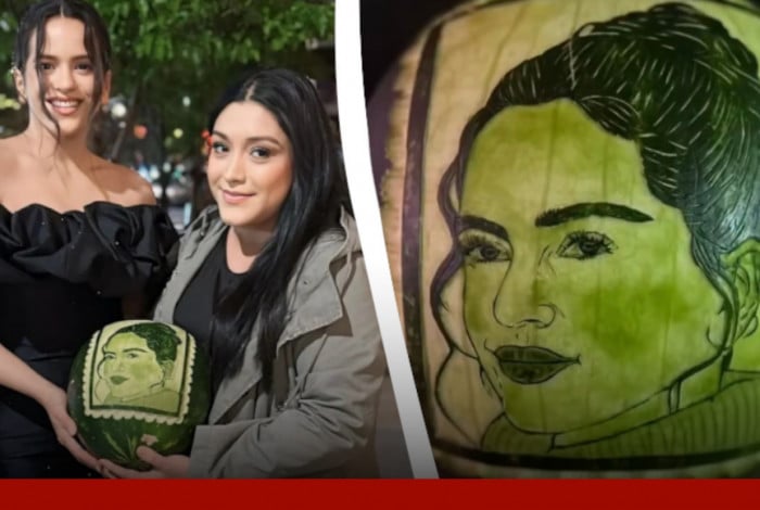 Cantora Rosalia ao lado da fã que a presenteou com uma melancia