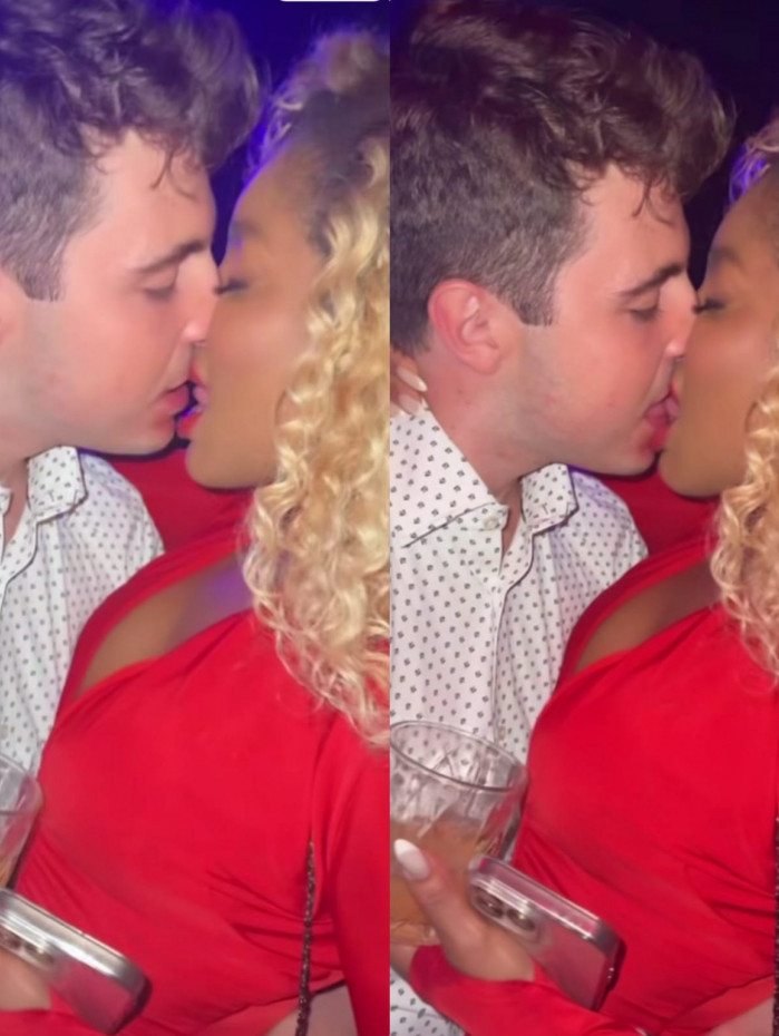 Cari&uacute;cha e filho de Gugu Liberato s&atilde;o vistos aos beijos em festa